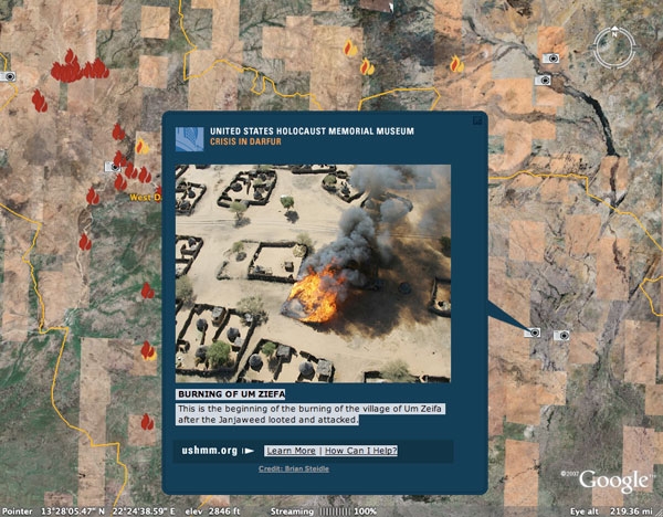 burning Darfur village
